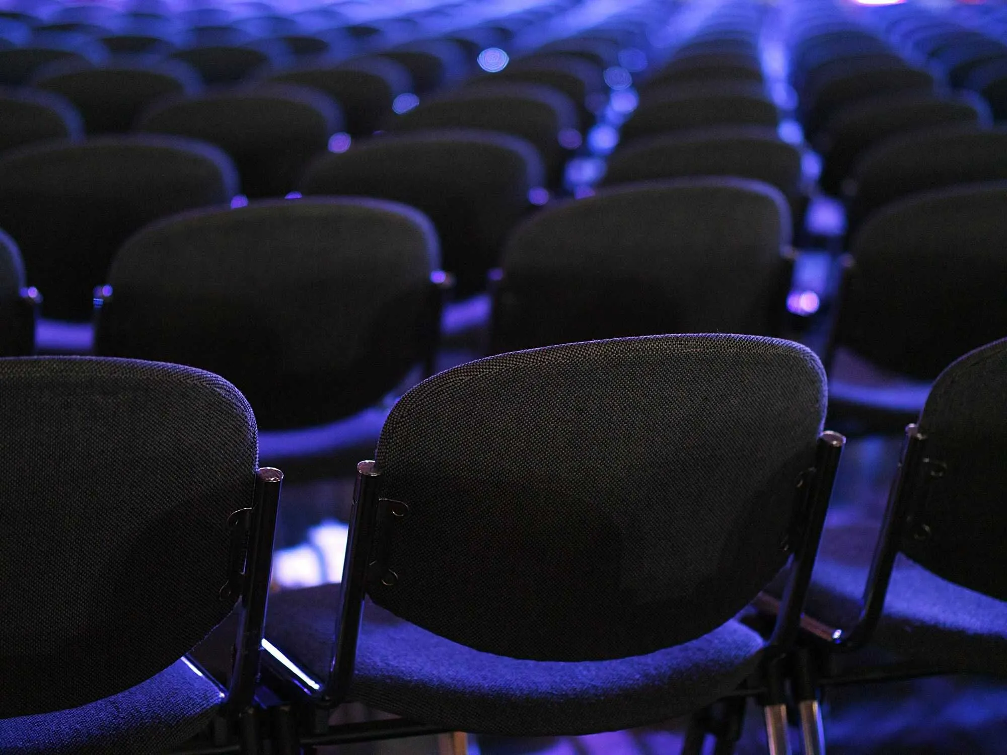 Empty auditorium chairs